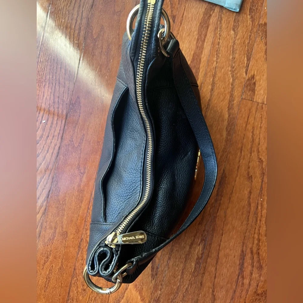 Michael Kors Black Hobo Bag with Gold Accents